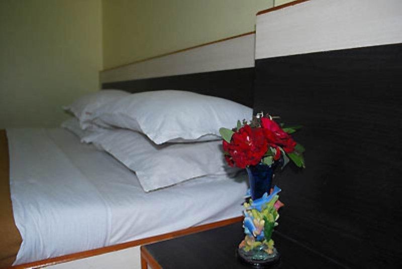 Sai Ganesh Hotell Shirdi Rom bilde
